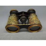 Pair of French opera glasses with brass detail of a huntsman