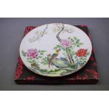 20th century Japanese circular dish decorated with Bird of Paradise among foliage, together with box