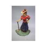 Victorian cast iron and painted door stop modelled as a lady golfer, 9ins tall
