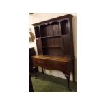 Late 18th century oak dresser, the top fitted with two central open shelves, flanked either side