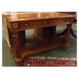 Victorian walnut side table fitted with two drawers on turned column legs with open shelf, raised on