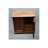 19th century oak table top smokers cupboard with two doors enclosing a fitted interior, with two
