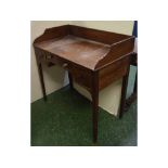 George III mahogany wash stand with galleried back, fitted with three drawers on tapering square