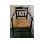 19th century ebonised ash framed rush seated armchair with X-work open back