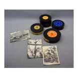 Five vintage film reels, two entitled "Tribute to Her Majesty" and dated 1937, the other dated