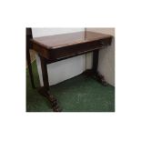 William IV mahogany single drawer side table with two plank ends, supported on four heavily carved