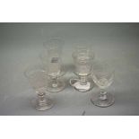Six assorted clear cut glass port or sherry glasses