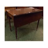 George III mahogany Pembroke table with two drop flaps with single drawer to end on ring turned legs