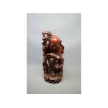 20th century Chinese root carved figure of an old sage, with young boy and stork to his side (a/