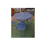 Decorative French blue painted pressed metal circular garden table with two matching twisted wire