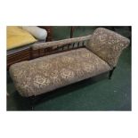 Edwardian walnut chaise longue with railed back, mushroom and floral upholstered seat on turned legs