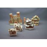 Six 19th century Staffordshire pastel burners, one modelled as a castle with central clock and