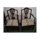 Pair of Georgian mahogany splat back armchairs with floral embroidered seats on tapering square legs