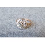 Diamond cluster ring, in the Victorian style, the central old cut brilliant of approx. 0.4cts,