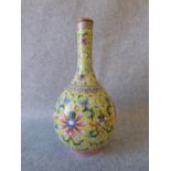 Chinese famille jeune bottle vase painted with coloured enamels, bearing Daoguang mark to base, 16.