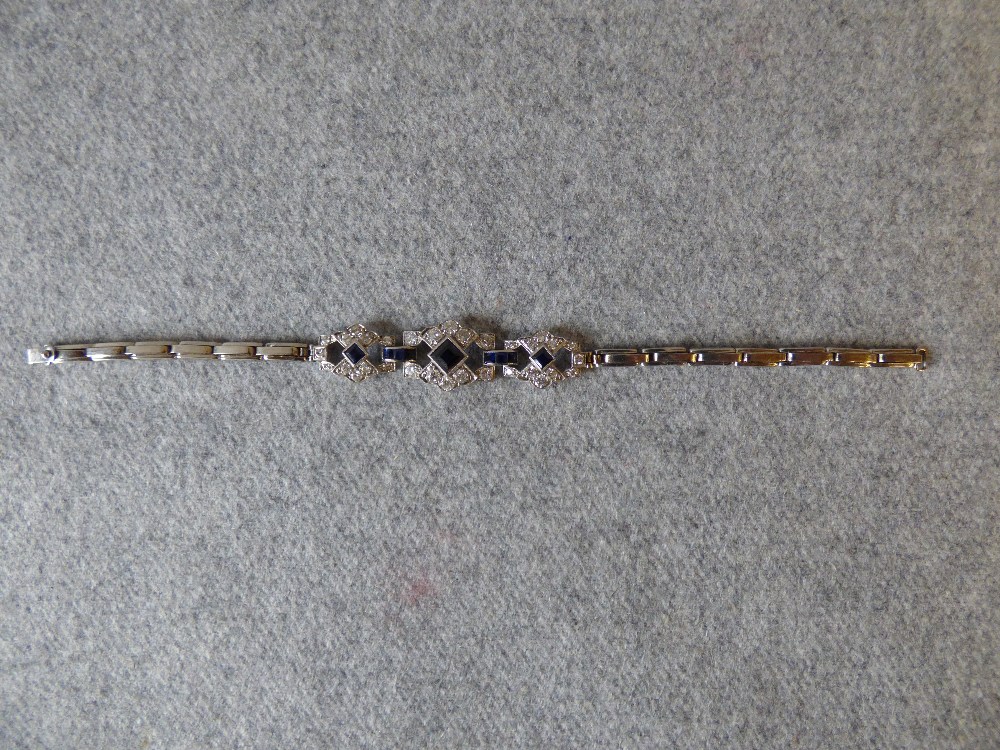 Sapphire & diamond bracelet with 3 graduated square cut sapphires to a brilliant cut set frame