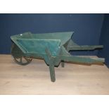 Wooden trug style wheelbarrow.