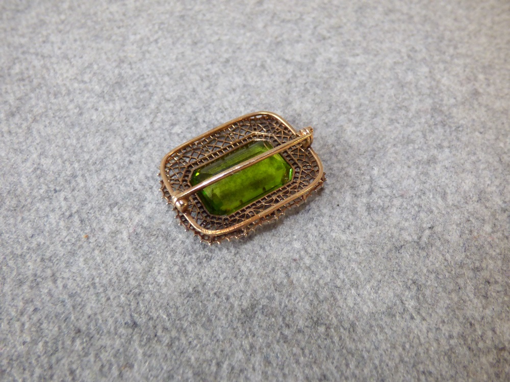 Peridot and rose diamond brooch with step cut of approx. 17.8ct to a shaped diamond set frame, - Image 3 of 3