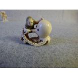 Chinese carved ivory netsuke of figure & octopus