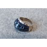 Sapphire and diamond Bombe cluster ring, the head with invisible set sapphires, with a border of