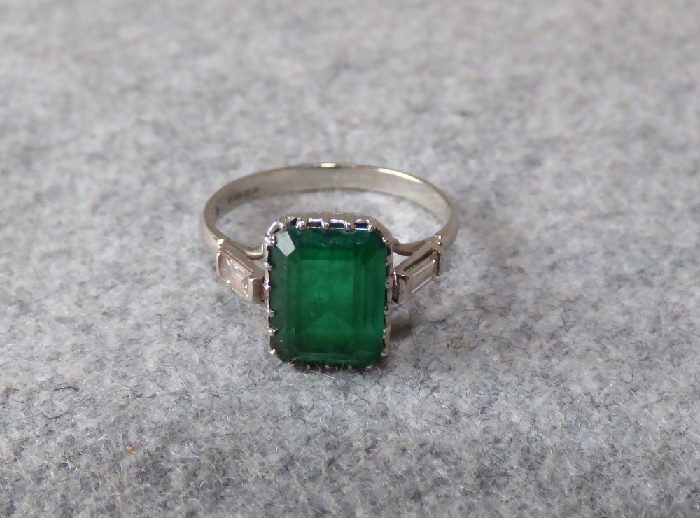 Emerald and diamond platinum ring, 2003, the step cut measuring 10.5mmH x 7.2mmW x 4.9mmD, with a - Image 7 of 9