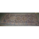 Turkistan rug with 5 octagonal hooked medallions with panel borders 99cm x 253cm