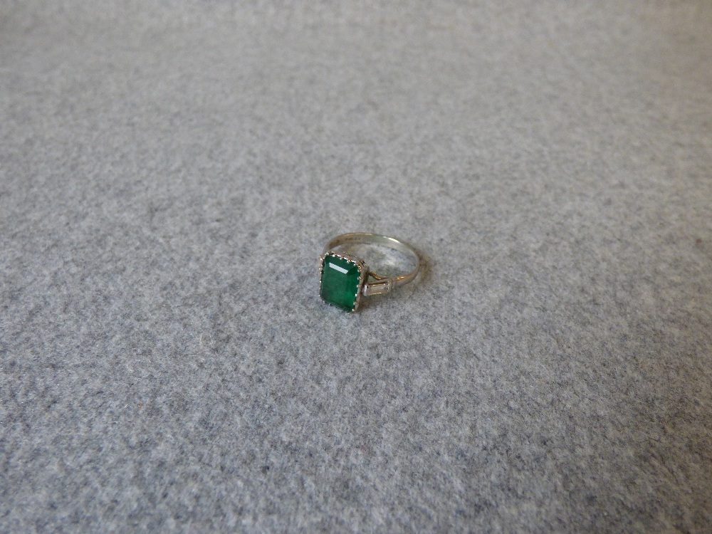 Emerald and diamond platinum ring, 2003, the step cut measuring 10.5mmH x 7.2mmW x 4.9mmD, with a - Image 3 of 9