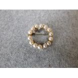 Cultured pearl and diamond, 18ct gold, circlet brooch, the fourteen pearls of approx. 5mm diameter