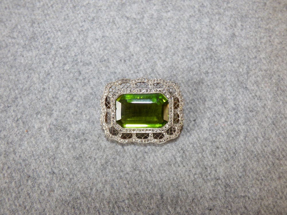 Peridot and rose diamond brooch with step cut of approx. 17.8ct to a shaped diamond set frame, - Image 2 of 3