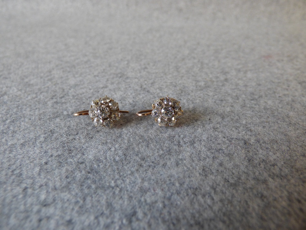 Pair of diamond cluster earrings, the central old cut brilliant enclosed by eight old cuts, the - Image 4 of 4