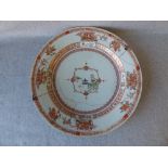 C18th Chinese porcelain charger in iron red, 7 & gilt the centre painted a pagoda 35.5cm