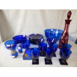 Qty of blue glass drinking glasses, plates, bowls etc & cranberry glass decanter