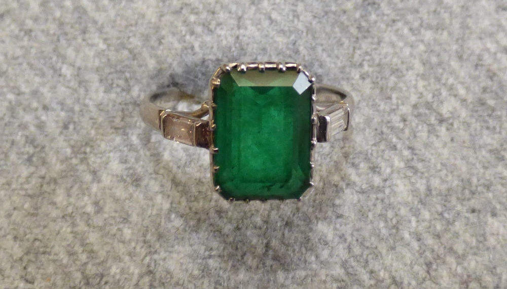 Emerald and diamond platinum ring, 2003, the step cut measuring 10.5mmH x 7.2mmW x 4.9mmD, with a - Image 8 of 9