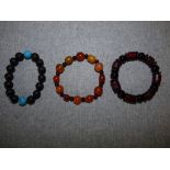 3 assorted beaded bracelets