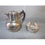 Silver hot water jug, Sheffield 1903, of spherical form with rising collar and sparrow beak spout, a