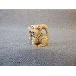 Chinese carved ivory netsuke figure of a dragon, with character marks to the base. PLEASE always