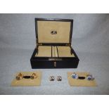 Black leather jewellery box, bears label 'Faberge' PLEASE always check condition before bidding or