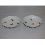 Pair of Chinese circular plates, decorated with orange bats 'Daoguang' blue marks to base 18.5 cm