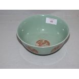 Chinese green ground circular bowl decorated with phoenix Daoguang blue mark to base 15 cm dia.