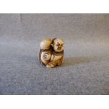 Chinese carved ivory Netsuke figure, character marks to base PLEASE always check condition before