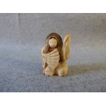 Chinese carved ivory Netsuke figure, character marks to base PLEASE always check condition before