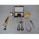 Jewellery case containing a silver wrist watch, a paste necklace, simulated pearls and other