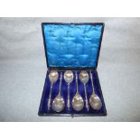 Cased set of six Victorian silver Apostle type spoons, London 1881, the oval bowls to hexagonal