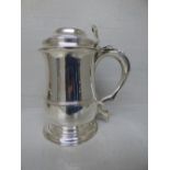 Silver hallmarked mid 18 century style large baluster lidded tankard. Open scroll thumb pierce.