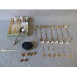 Collection of 13 Singapore white metal coin spoons & a boxed set of six Japanese spoons, also a pair
