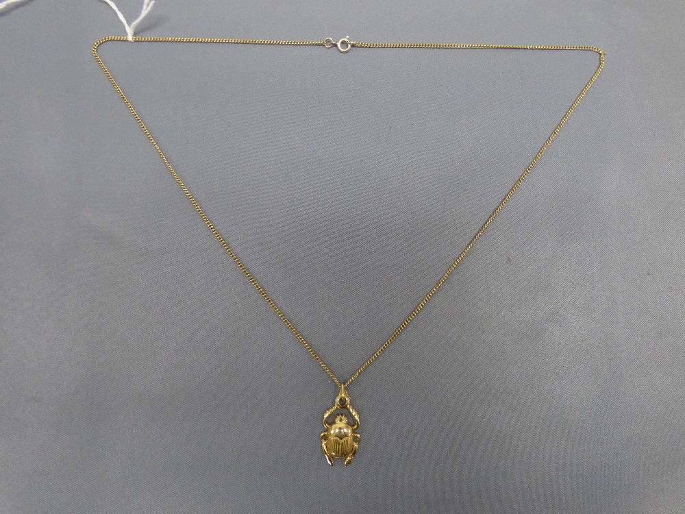 Egyptian Scarab beetle pendant, marked to the bale, 5g gross, on a 9ct gold chain, 5g gross PLEASE - Image 2 of 2