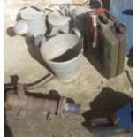 Assorted garden items to include watering cans, water pump, Engineers vice, tank etc PLEASE