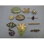 Chinese silver gilt jade set leaf brooch with a collection of nine other brooches PLEASE always