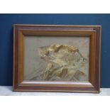 Early C20th fine quality silk work panel depicting a leopard poised upon a rocky outcrop,