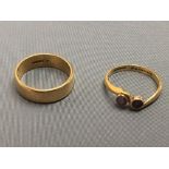 22ct gold wedding ring, 6.8g gross; with a 22ct gold ring set with two amethysts, 2.8g gross